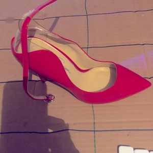 Cherry Red patten leather Jessica Simpson stiletto.Clear heel at ankle worn once